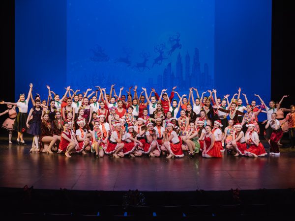 Group of dancers in holiday attire