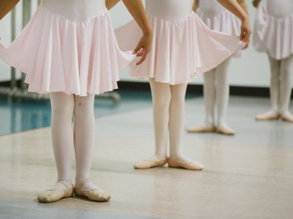 Young ballerinas practicing in studio